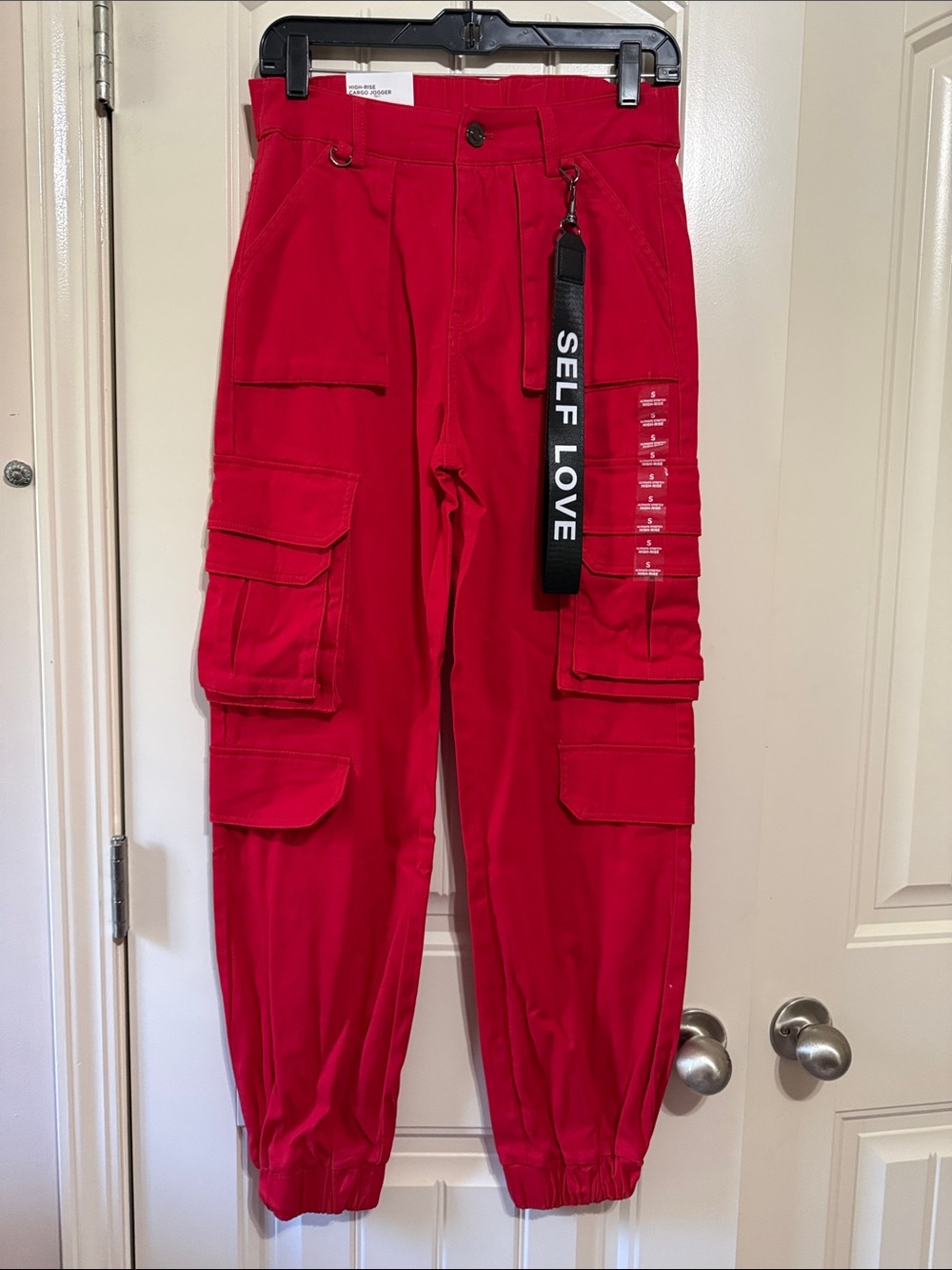 Red Cargo Jogger Pants with 'Self Love' Strap